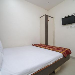 Spot On Shraddha Hotel